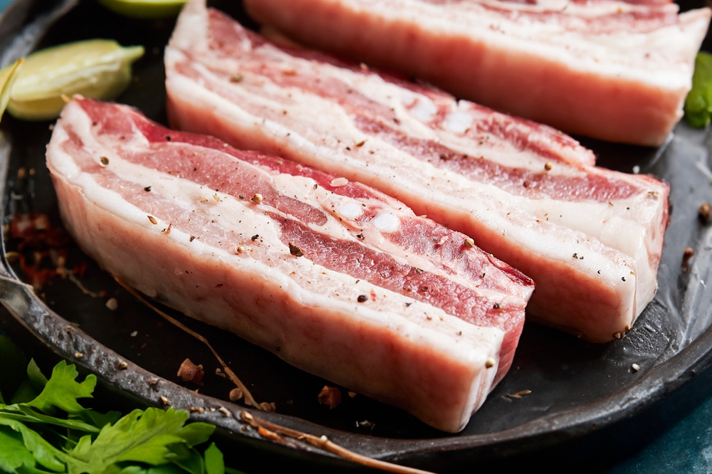 Frozen bone-in pork bellies rind on, Poland origin