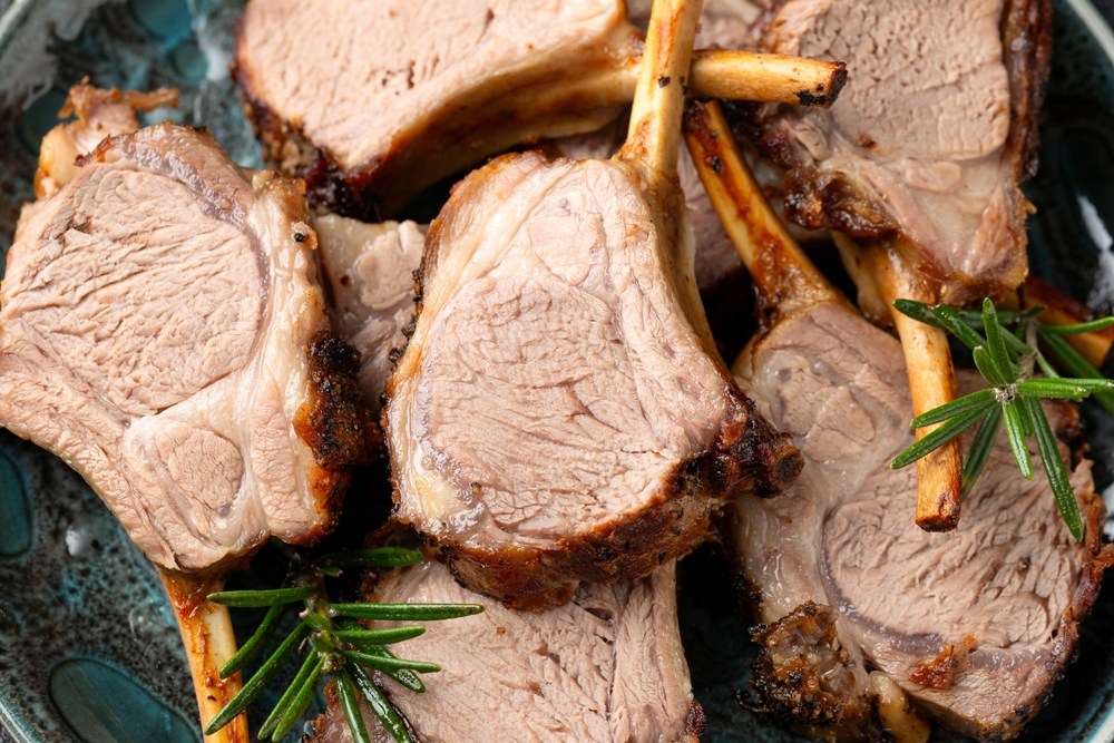 Family enjoying a traditional roast lamb dinner